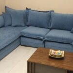 ركنة مودرن حرف L فخمة بتصميم ممتد وشازلونج فسيح مع خياطة فرنسية بارزة - 300×180 سم خشب طبيعي مودرن وجودة عالية وودجي